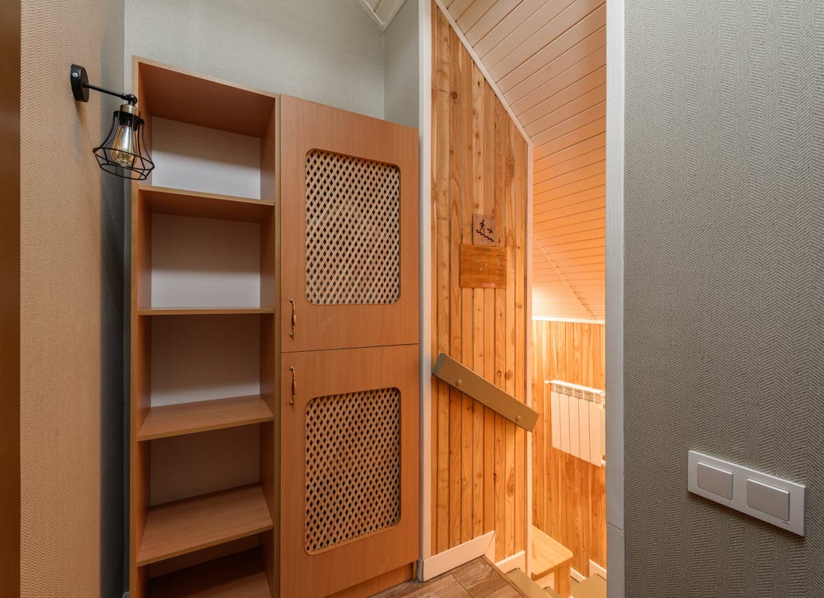 Made-to-measure under-stairs cupboard scribed to the staircase angle